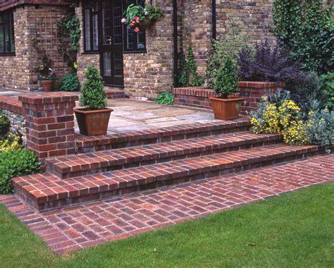 Concrete orbs for the garden: Landscape & Garden Design & Build | Brick garden, Brick ...