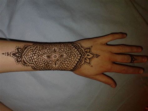 Black flying birds tattoo on both wrist. Wrist Henna · A Henna Tattoo · Creation by Louise A.