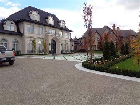 Concrete landscape curbing is the perfect solution to a long time problem. This impressive private residential driveway was created ...