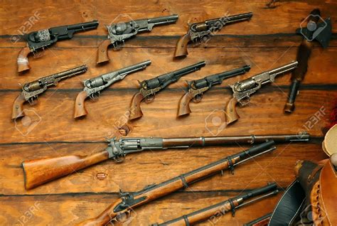 876292 Display Of Old West Guns And Rifles Stock Photo 1300×874