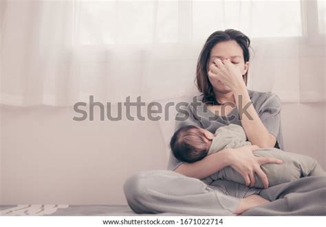 Tired Mother Suffering Experiencing Postnatal Depressionhealth Stock