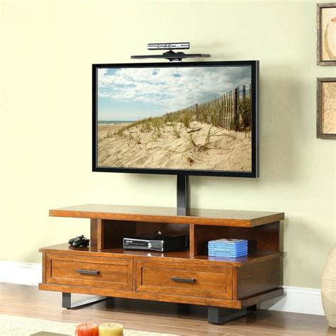 Here is another tv stand that ensures higher compatibility with its specially designed vesa mounting holes. 50 Inspirations Wood TV Stands With Swivel Mount | Tv ...