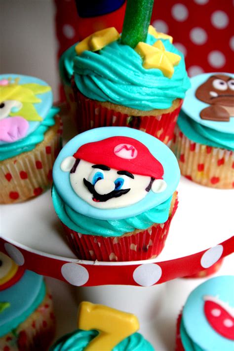 Mario bros cake, with individual remote cake (see other pic) for the birthday boy fondant cakes with gumpaste accessories. Super Mario Party {Real Parties I've Styled} | Amy's Party Ideas