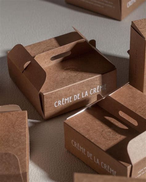 These disposable storage packaging square boxes for cookies feature clear plastic lids cutouts with a decorative top with chalk board on the go: Bureau Rabensteiner on Instagram: "Fresh from the printer ...