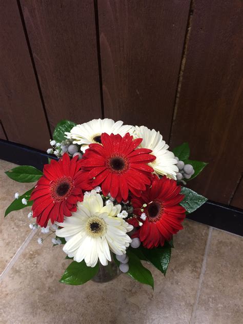Similarly, other colors, too, have different significance and are enhance the feel of the wedding. Alabama bridal bouquet with red and white gerbera daisies ...