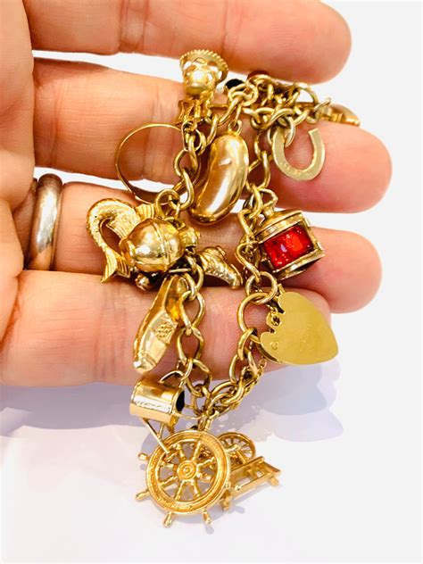 Stunning Vintage 9ct Yellow Gold Charm Bracelet With 16 Gold Charms