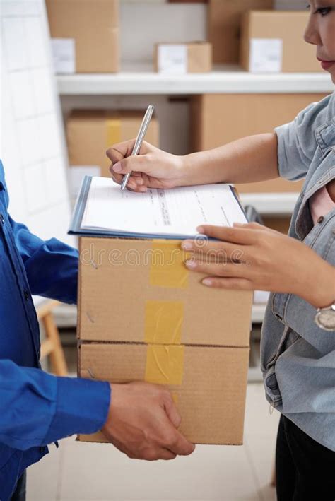 Signing Parcel Documents Stock Image Image Of Shipment 127950635