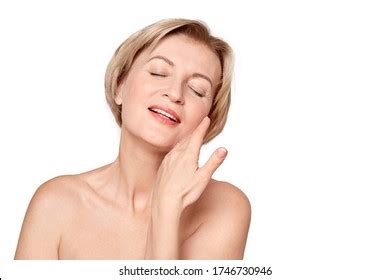 Naked Mature Woman Standing Isolated On Foto Stock