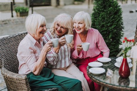 Waist Up Photo Of Old Ladies Females Having Rest And Drinking Tea