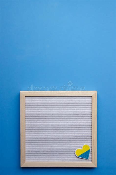 Flatlay Vertical Composition With A Blue Background A Letter Board In