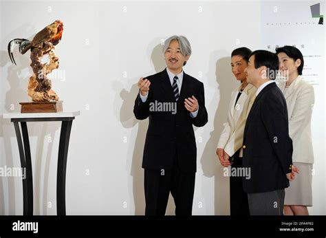 Japanese Prince Akishino Left Explains About An Exhibit Of A Pair Of