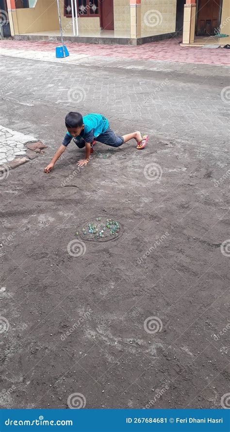 Sidoarjo A Boy Playing Colorful Marbles Editorial Photo Image Of
