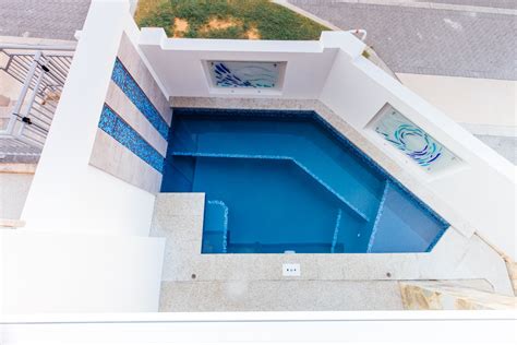 A Tiny Courtyard With A Custom Concrete Pool Multi Levels And Water
