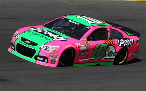 Danica Patrick Driving Pink And Green Go Daddy Car At Charlotte Photos