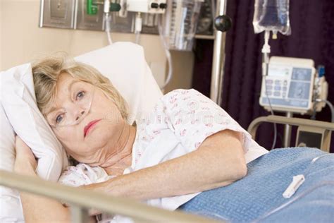 Senior Woman Lying In Hospital Bed Stock Image Image Of Illness Inside 6428373