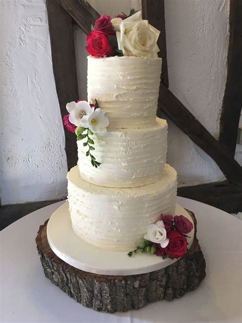 3 Tier Buttercream Frosted Wedding Cake With Fresh Flowers Buttercream