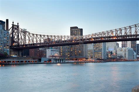 Queensboro Bridge Over The East River In New York City At Night Stock