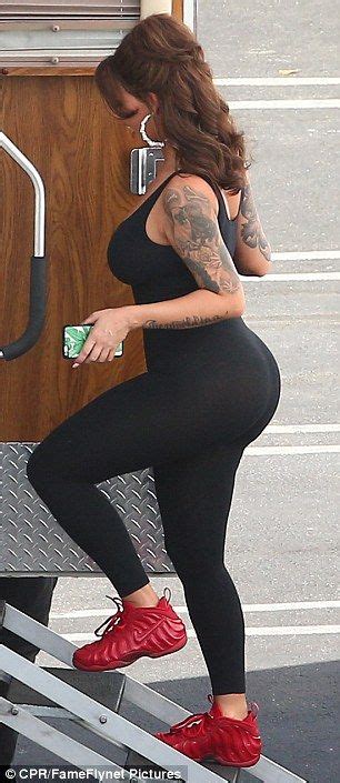 Amber Rose Looks Voluptuous In Skintight Black Ensemble Ahead Of Show