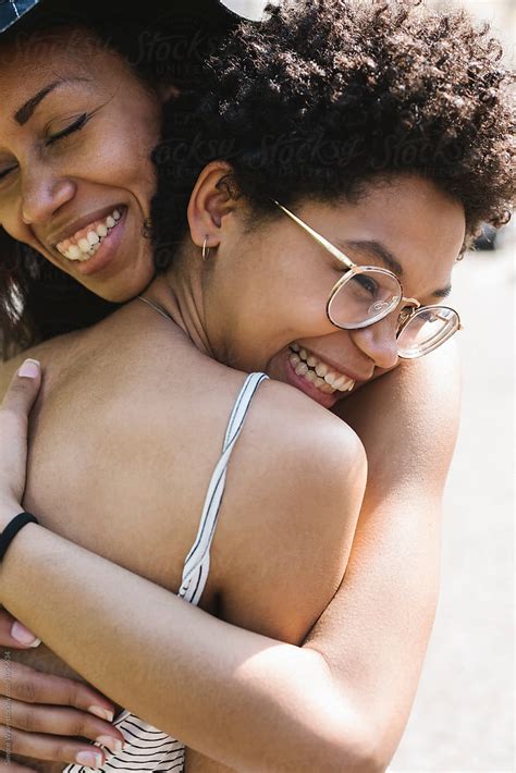 Best Friend Women Hugging Outdoors By Stocksy Contributor Simone Wave Stocksy