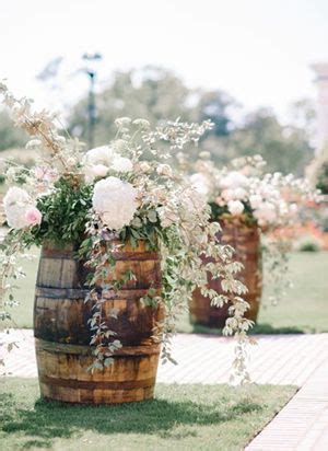 Bringing the woods onto your table décor is as easy as incorporating moss garlands with leaves and delicate branches. Country Wedding Ideas: 20 Ways to Use Wine Barrels ...