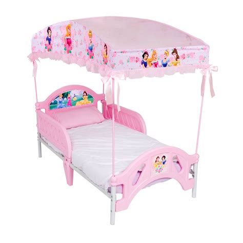 Create a fairytale bedroom with this disney princess canopy toddler bed from delta children! Disney Princess Toddler Bed with Canopy