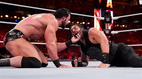 roman reigns vs drew mcintyre photos wwe