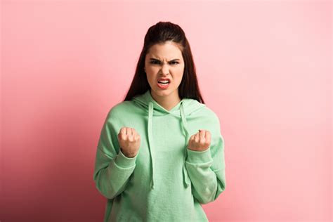 Angry Girl Showing Clenched Fists While Looking Free Stock Photo And Image
