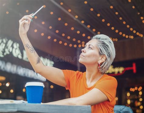 Attractive Blonde Girl Making Selfie At Cafe And Drinking Coffee Stock Image Image Of Face