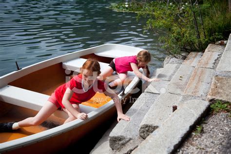 Girls In A Rowboat At The Lake Stock Photo Royalty Free Freeimages
