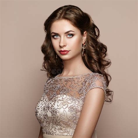 Fashion Portrait Of Beautiful Woman In Elegant Dress Stock Image