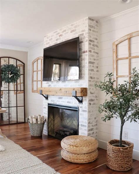 Open Living Room With A Tv Over A Brick Fireplace Soul And Lane