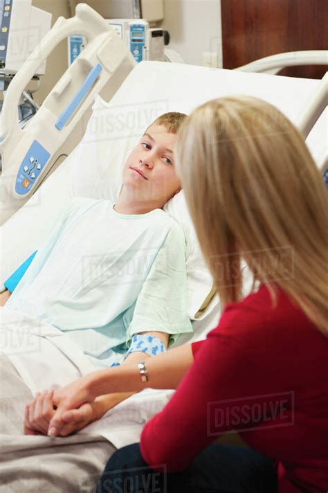 Mother Visiting Son In Hospital Stock Photo Dissolve