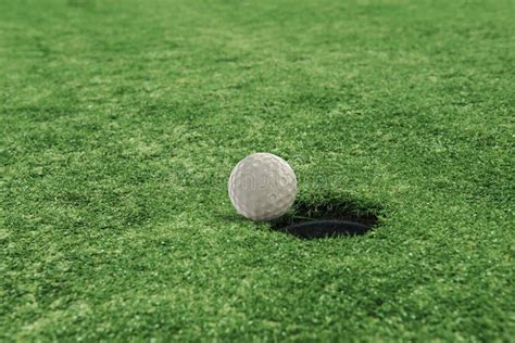 Golf Ball Near The Hole In A Grass Field Stock Image Image Of Golfing