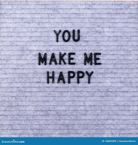The Words You Make Me Happy On Grey Felt Letter Board Stock Photo