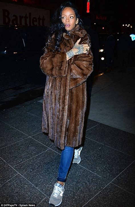 Rihanna Steps Out In Baggy Layers But Adds Extravagant Touch With Mink