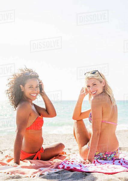 Female Friends On Beach Stock Photo Dissolve