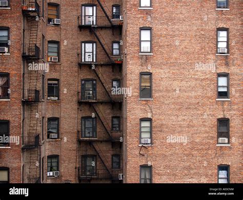Brick Walls And Windows On Apartment Buildings In Manhattan In New York