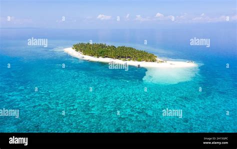 A Tropical Island In The Distance Island With A White Sandy Beach