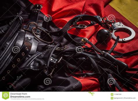 Bdsm Toys And Gothic Corset With Rose Background Stock Image Cartoondealer Com