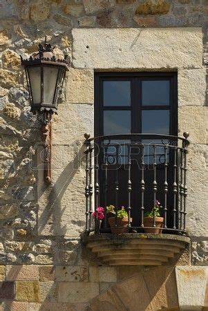 Balcones y ventanas .... - Página 3 Th?id=OIP