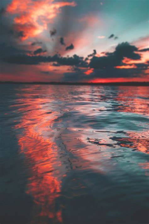 Coastal Photo Of The Sunset Sky Reflected In The Water Water