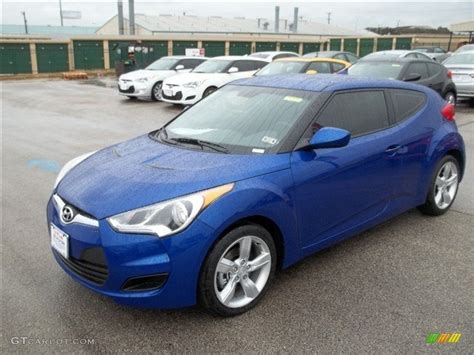 The 2013 hyundai veloster is a hatchback with three doors (one on the driver side and two on the passenger side). Marathon Blue 2013 Hyundai Veloster Standard Veloster ...