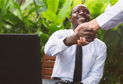 Premium Photo African Businessmen Shaking Hands