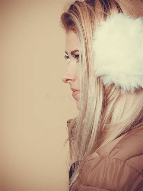 Blonde Woman In Winter Earmuffs And Jacket Stock Image Image Of