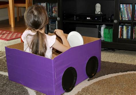 It's as simple as rigging a white sheet to the side of your home, or pinning one up on the garden fence. DIY Cardboard Box Car for a Drive In Movie Night