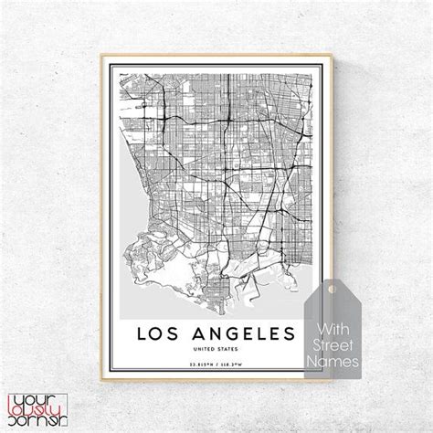 A Framed Map Of Los Angeles With The Names And Streets In Black On A