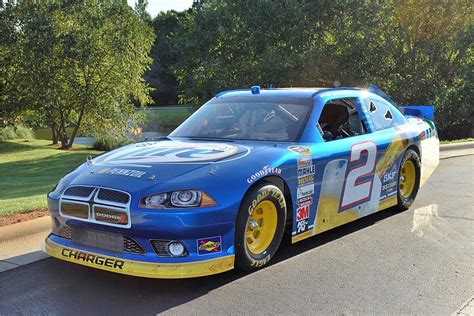 Nascar is also removing the wicker from the spoilers and mandating a roll. 2012 DODGE CHARGER NASCAR RACE CAR - 191870
