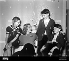 GINGER ROGERS on set candid with 3 children of photographer James Abbe ...