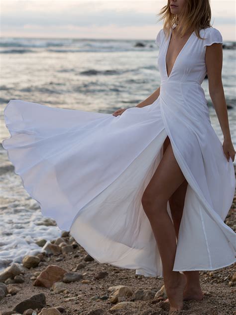 The gold embroidery and beading elevate this simple triangular bodice maxi boho wedding dress. White Wrap Thigh Slit Deep V-neck Short Sleeve Bohemian ...