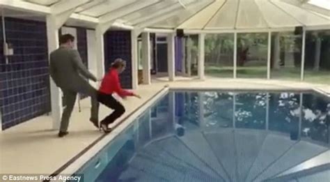 Video Shows Estate Agent Being Pushed In A Swimming Pool By Colleague Daily Mail Online